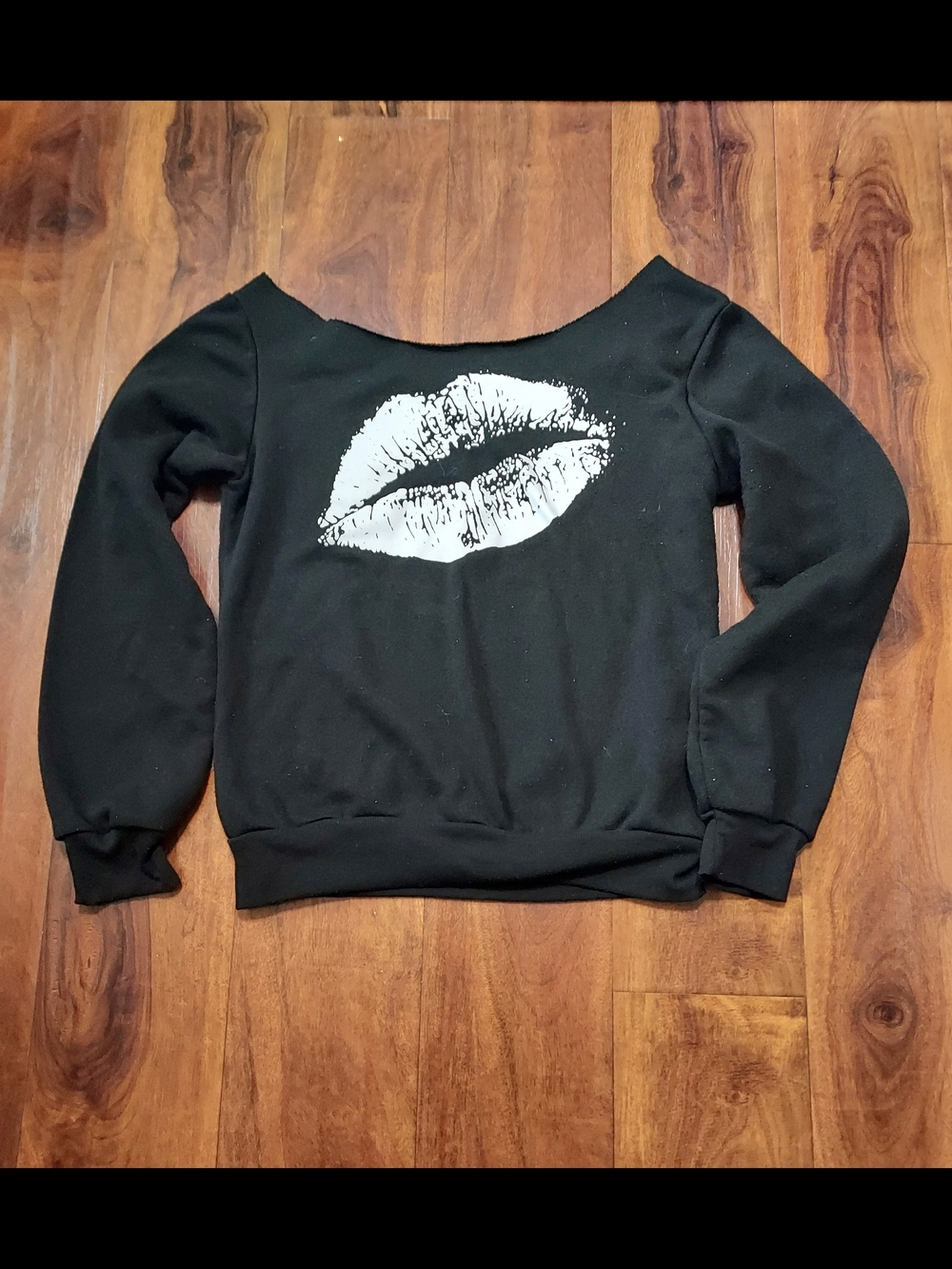 Fashion Nova Black Off-the-Shoulder Sweater with White Lip Graphic